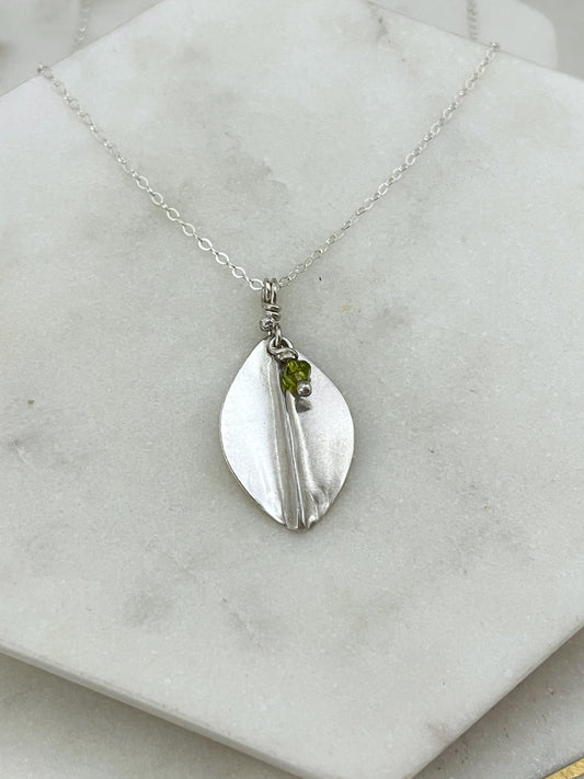 Forged sterling silver leaf necklace with olivine gemstone