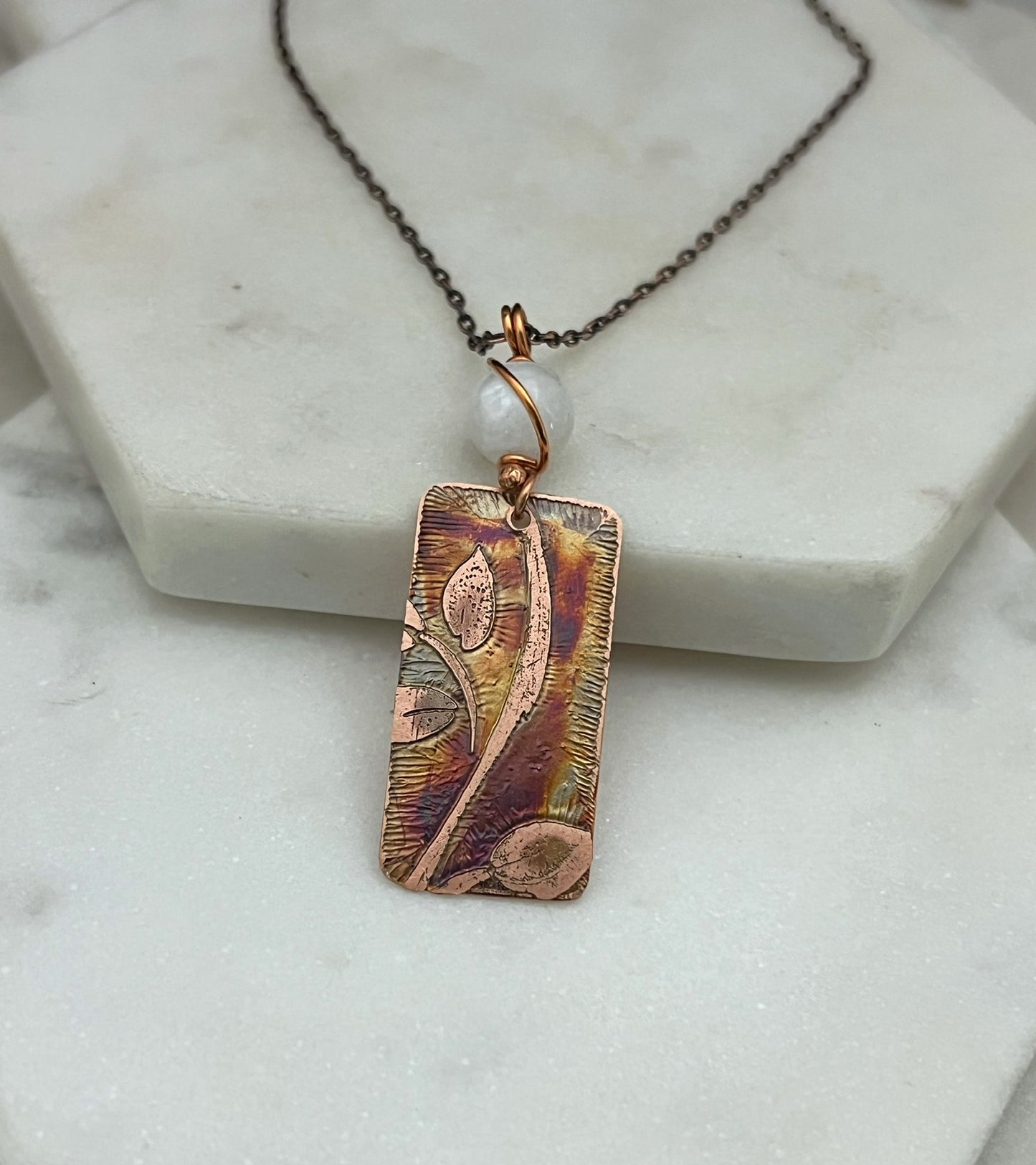 Acid etched copper leaf necklace with moonstone gemstone