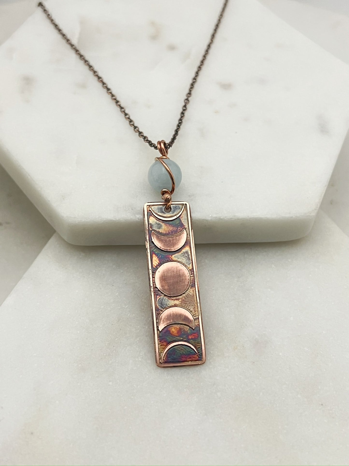 Moon phase acid etched copper necklace with aquamarine gemstone