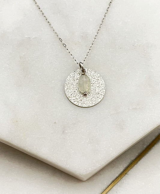 Sterling silver circle necklace with peridot