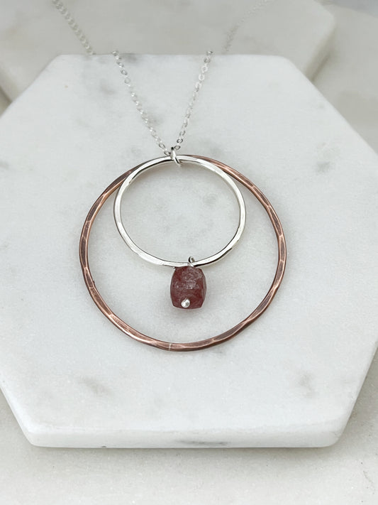 Sterling silver and copper forged hoop necklace with strawberry quartz