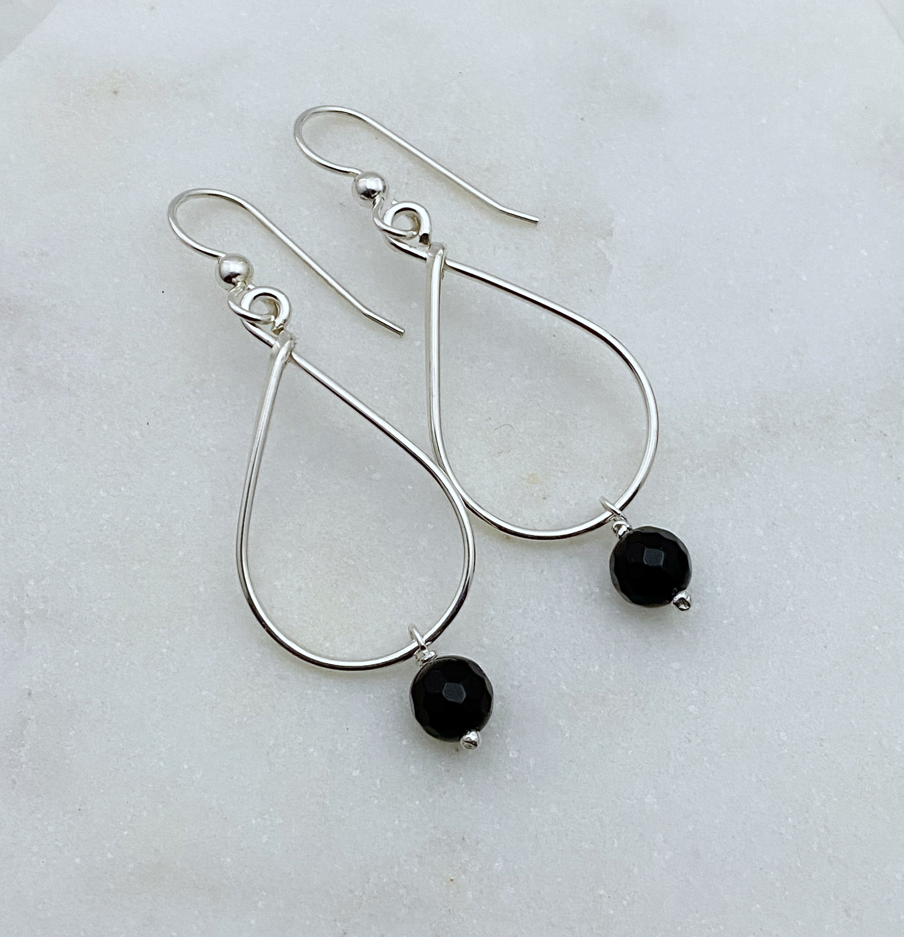 Artisan silver and outlet onyx earrings.