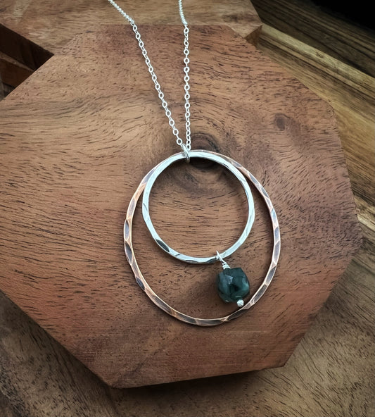 Sterling silver and copper forged hoop necklace with emerald